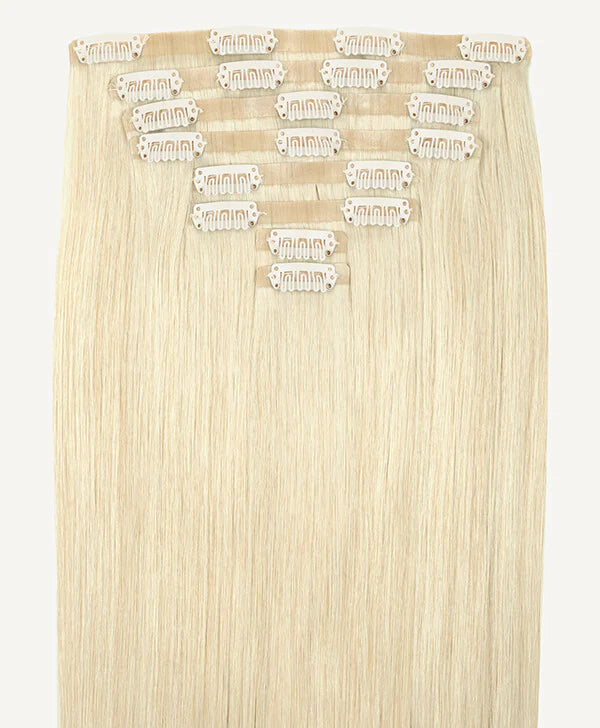 Set of blonde clip in hair extensions with clips